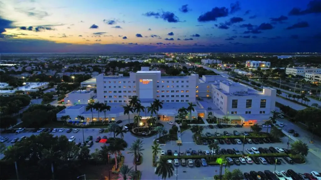 Florida confirms Dengue death as cases surge during one of its worst outbreaks A well-known hospital in Florida with many cars parked outside and all its lights turned on
