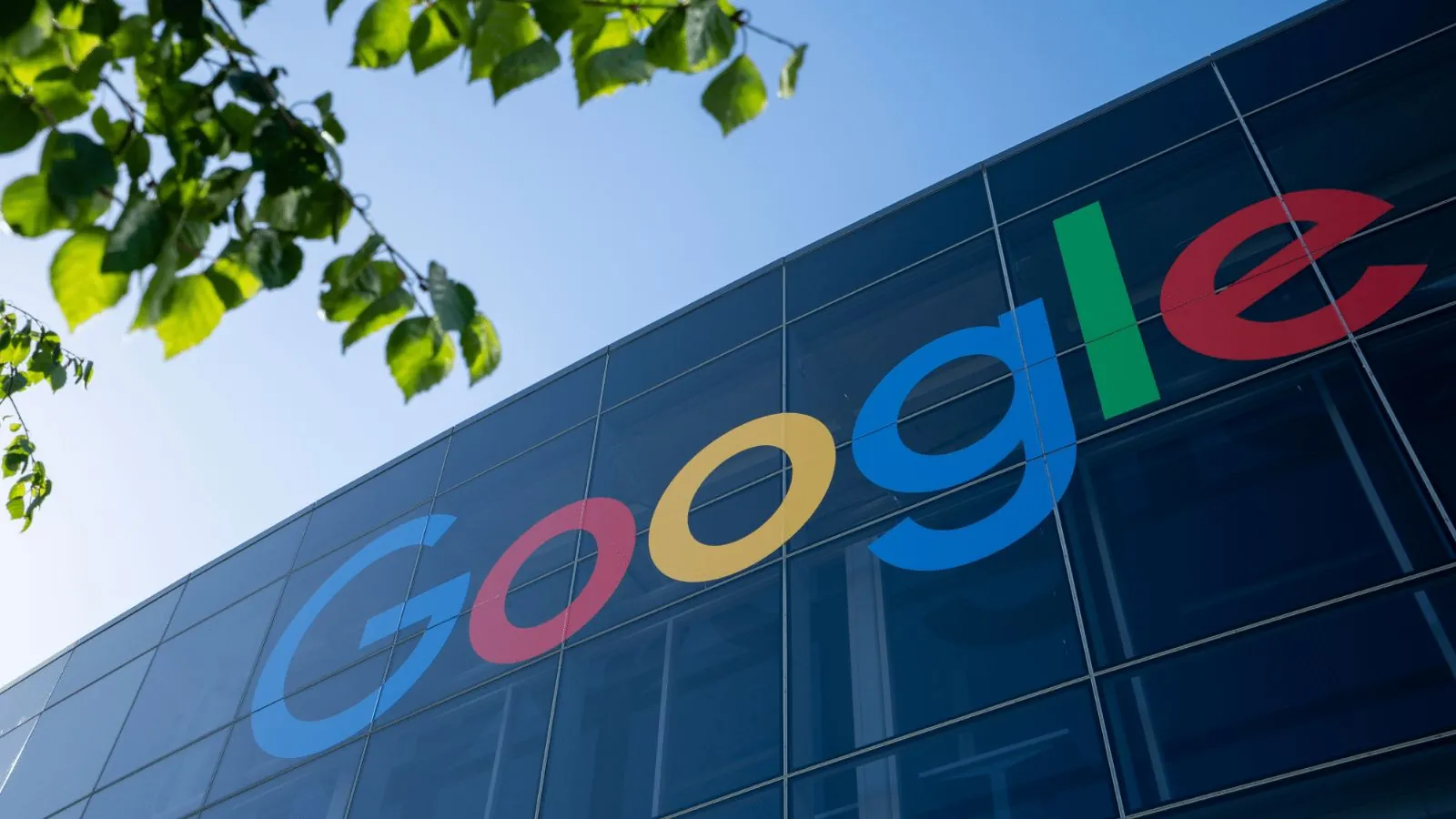 Google warns of a new AI threat that could change cybersecurity A Google sign attached to a large building with huge glass windows