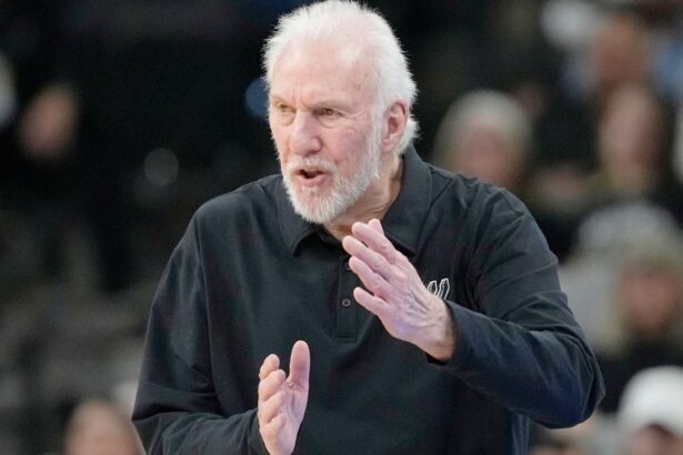 The legendary coach giving instructions during a Spurs game