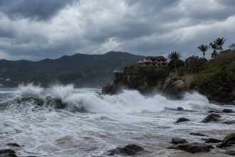 Hurricane Polo reaches category 5 as Mexico watches its dangerous path The rough sea crashing against a rocky wall supporting a house