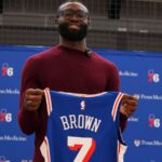 Jaylen Brown receives the key to Boston in emotional Celtics farewell Jaylen Brown holding the Philadelphia jersey with the number 7 he will wear with the team