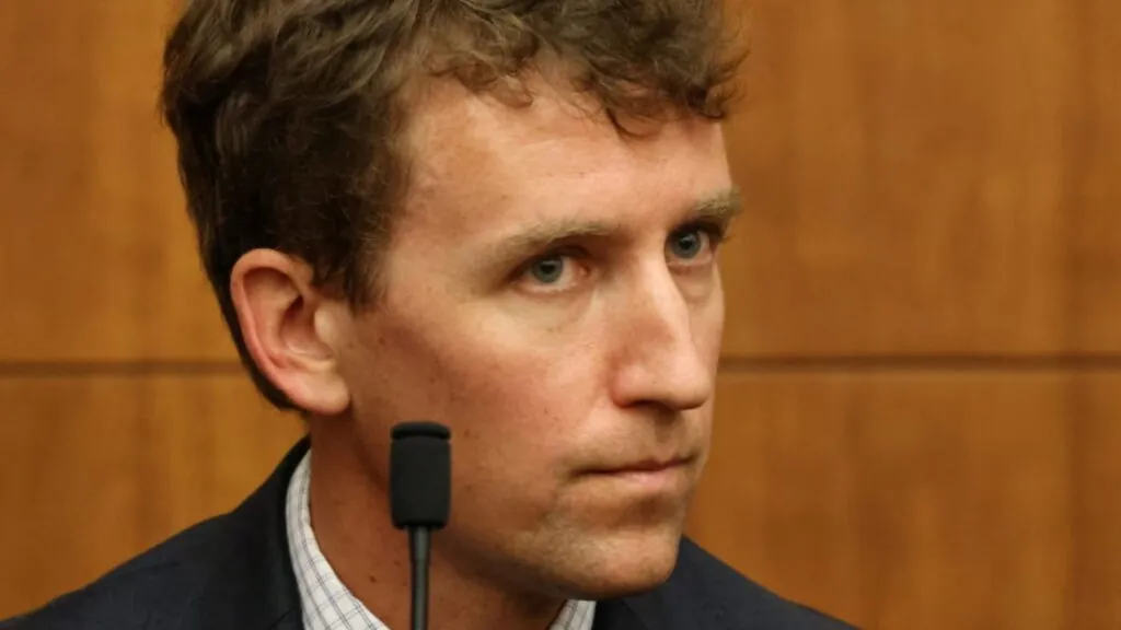 Patrick Clancy opens up about losing his children and forgiving his ex-wife Patrick sitting in a courtroom, staring intently at the woman accused of killing his children