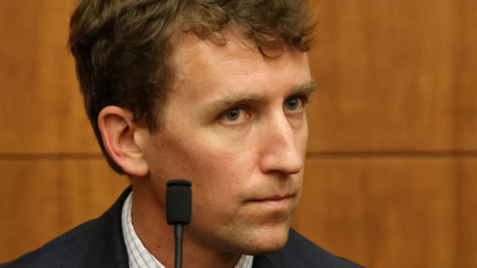 Patrick Clancy opens up about losing his children and forgiving his ex-wife Patrick sitting in a courtroom, staring intently at the woman accused of killing his children