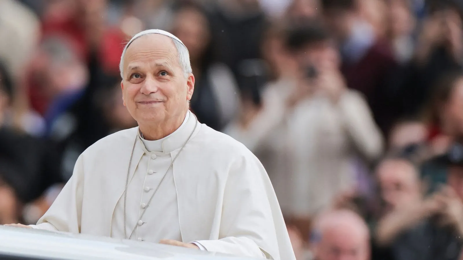 Pope Leo XIV honors 9/11 victims with a powerful message of peace Pope Leo XIV riding in his carriage while greeting everyone present during one of his visits
