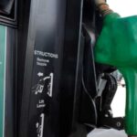 Record Diesel prices put new pressure on United States farmers during harvest A green diesel fuel pump with the product prices displayed on one side