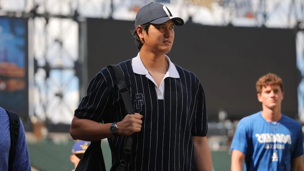 Shohei Ohtani heads to the injured list as Dodgers call up top prospect The Japanese star walking across the field in casual clothes while carrying his personal bag