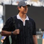 Shohei Ohtani heads to the injured list as Dodgers call up top prospect The Japanese star walking across the field in casual clothes while carrying his personal bag
