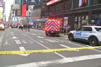 Times Square shooting: Attack leaves one woman dead and another person injured Many police cars and ambulances are parked with their sirens on while assisting the attacker