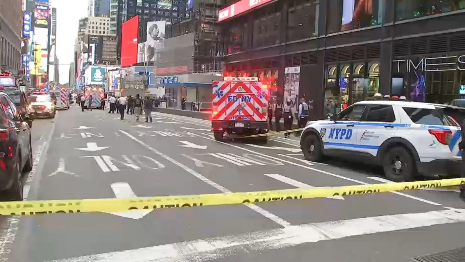 Times Square shooting: Attack leaves one woman dead and another person injured Many police cars and ambulances are parked with their sirens on while assisting the attacker
