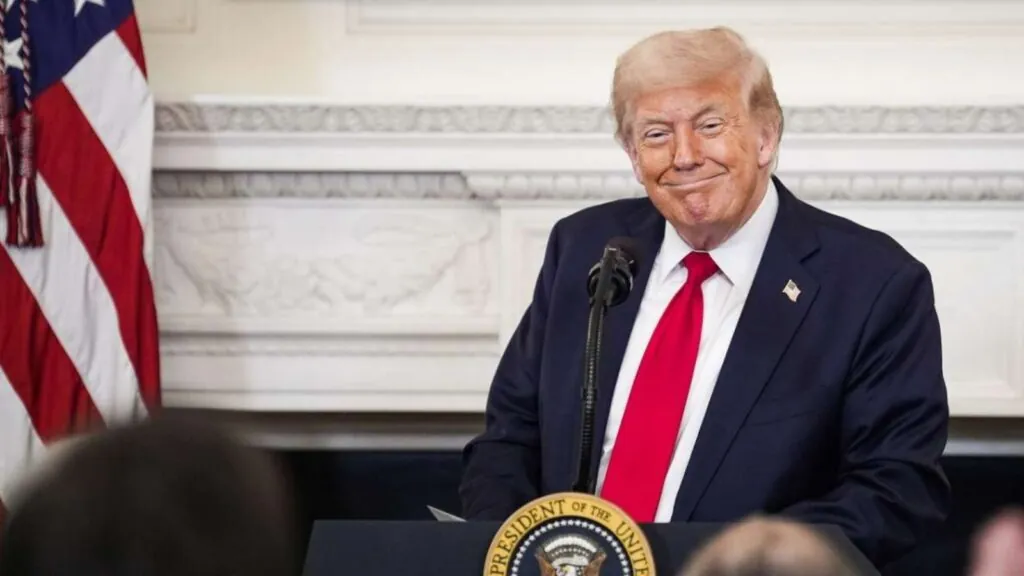 Trump again challenges Supreme Court over mail-in voting restrictions Trump smiling at a press conference from the White House