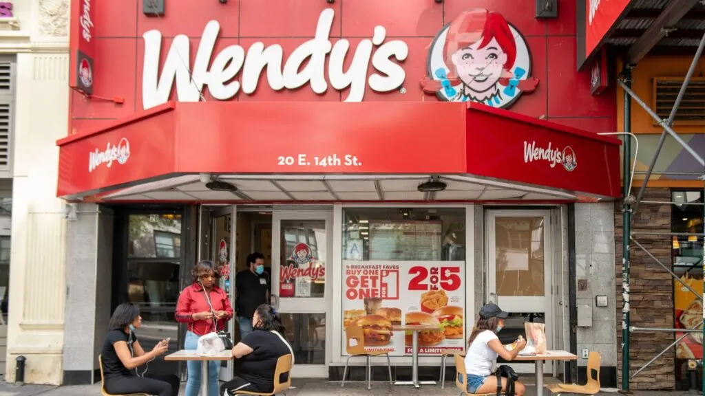 Wendy’s faces bankruptcy as dozens of Florida restaurants shut down A panoramic view of one of the famous restaurant’s locations featuring its iconic red and white colors