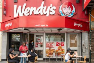 Wendy’s faces bankruptcy as dozens of Florida restaurants shut down A panoramic view of one of the famous restaurant’s locations featuring its iconic red and white colors