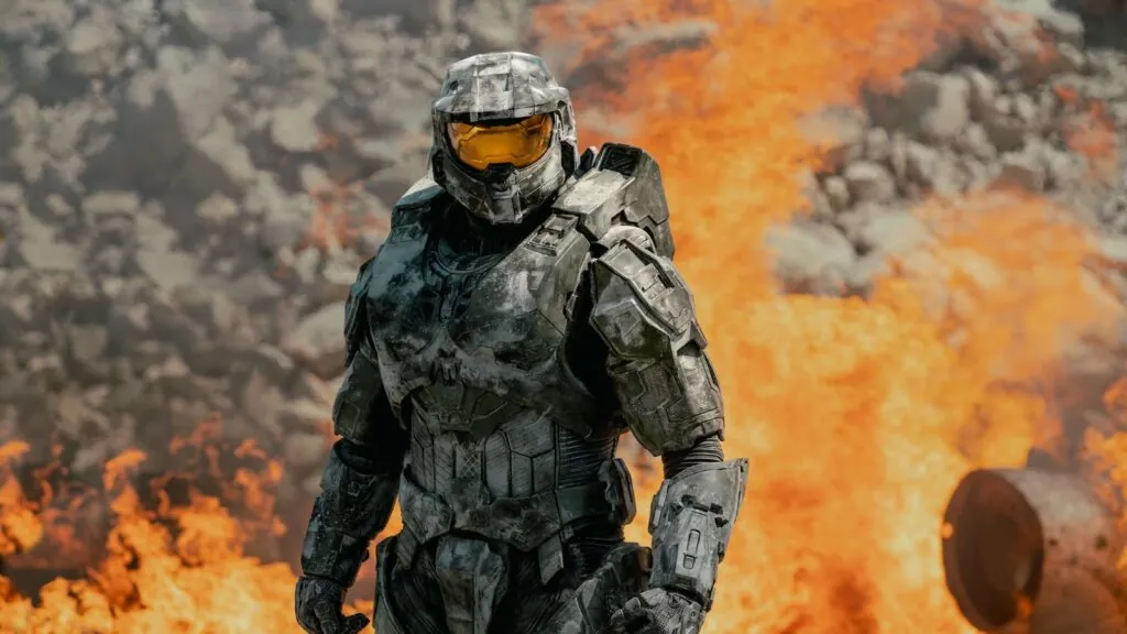 Xbox makes a stunning move as activision takes over the next Halo game The main character of the game walking amid explosions