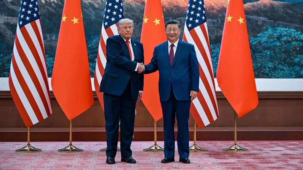 Xi Jinping meets Trump as China emerges as a global power The presidents of both powers shaking hands while being photographed