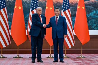 Xi Jinping meets Trump as China emerges as a global power The presidents of both powers shaking hands while being photographed